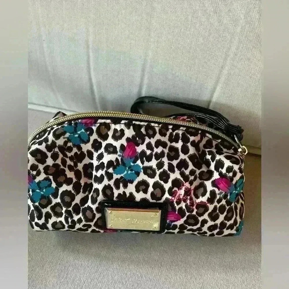 Betsey Johnson Handbags - Betsey Johnson Cheetah Rosebuds Mini bag/cosmetic bag with wristlet strap.